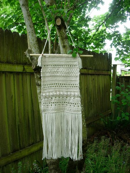 crochet - wall hanging at danas fence.jpg