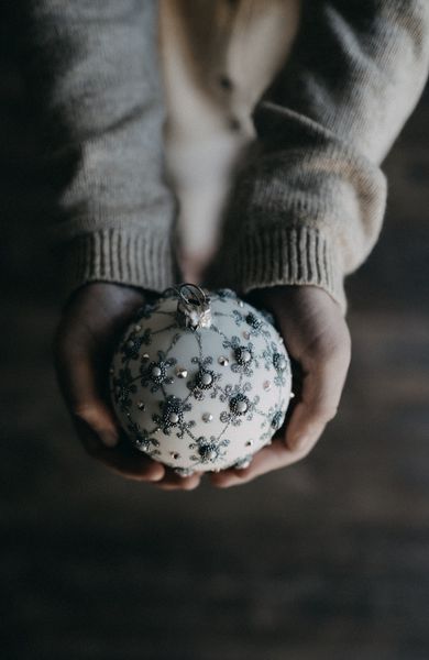 Girl with Christmas ornament.jpg