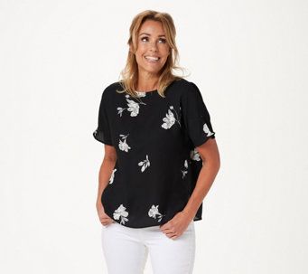 VC floral blouse.jpg