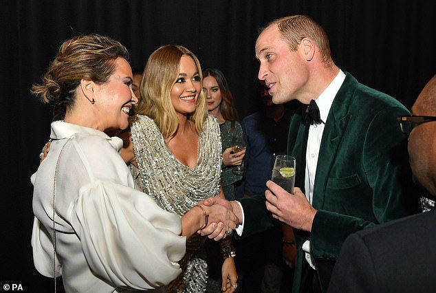 20973594-7682021-Prince_William_met_singer_Rita_Ora_middle_and_other_guests_as_he-a-35_1573680821864.jpg