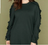 LAne Bryant Green ruffle arm sweater.png