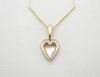 kabana-14k-gold-heart-mother-of-pearl-diamond-pendant_800x.jpg