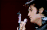 GIF--Elvis--Black-Leather--Singing-Into-Microphone.gif