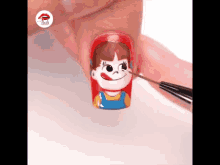 GIF--Painting-On-Nail--In-Process--Young-Boy-Tongue-Out-as-if-Delicious.gif