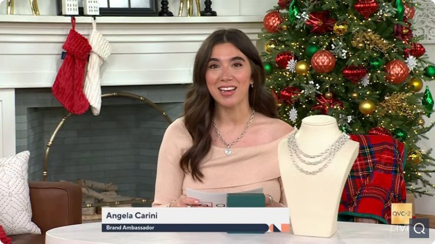 QVC2 host presenting a product