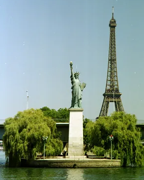 Statue of Liberty and Eiffel Tower Paris.png