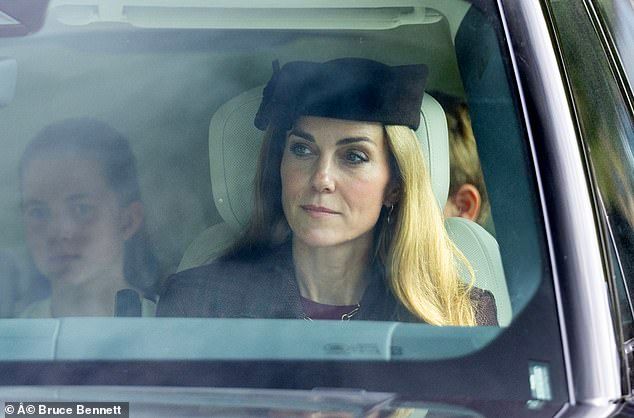 101501443-15029389-Princess_Kate_was_a_picture_of_elegance_wearing_a_black_hat_with-a-1_1756037743479.jpg